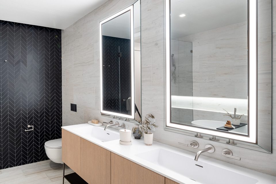 Master bathroom renovation in Chelsea apartment featuring black and white graphic design