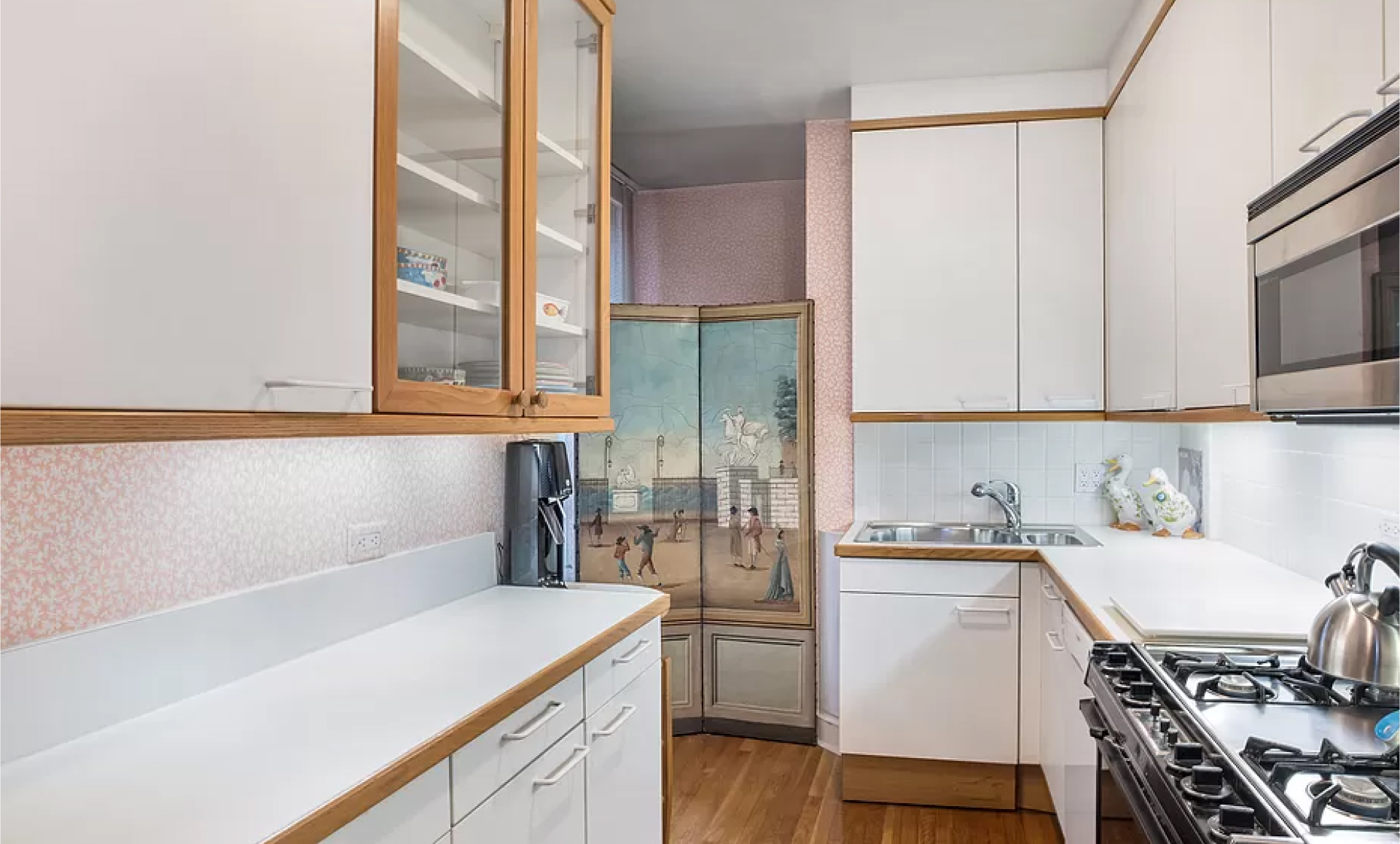 Midtown East apartment renovation before photo showing outdated living room