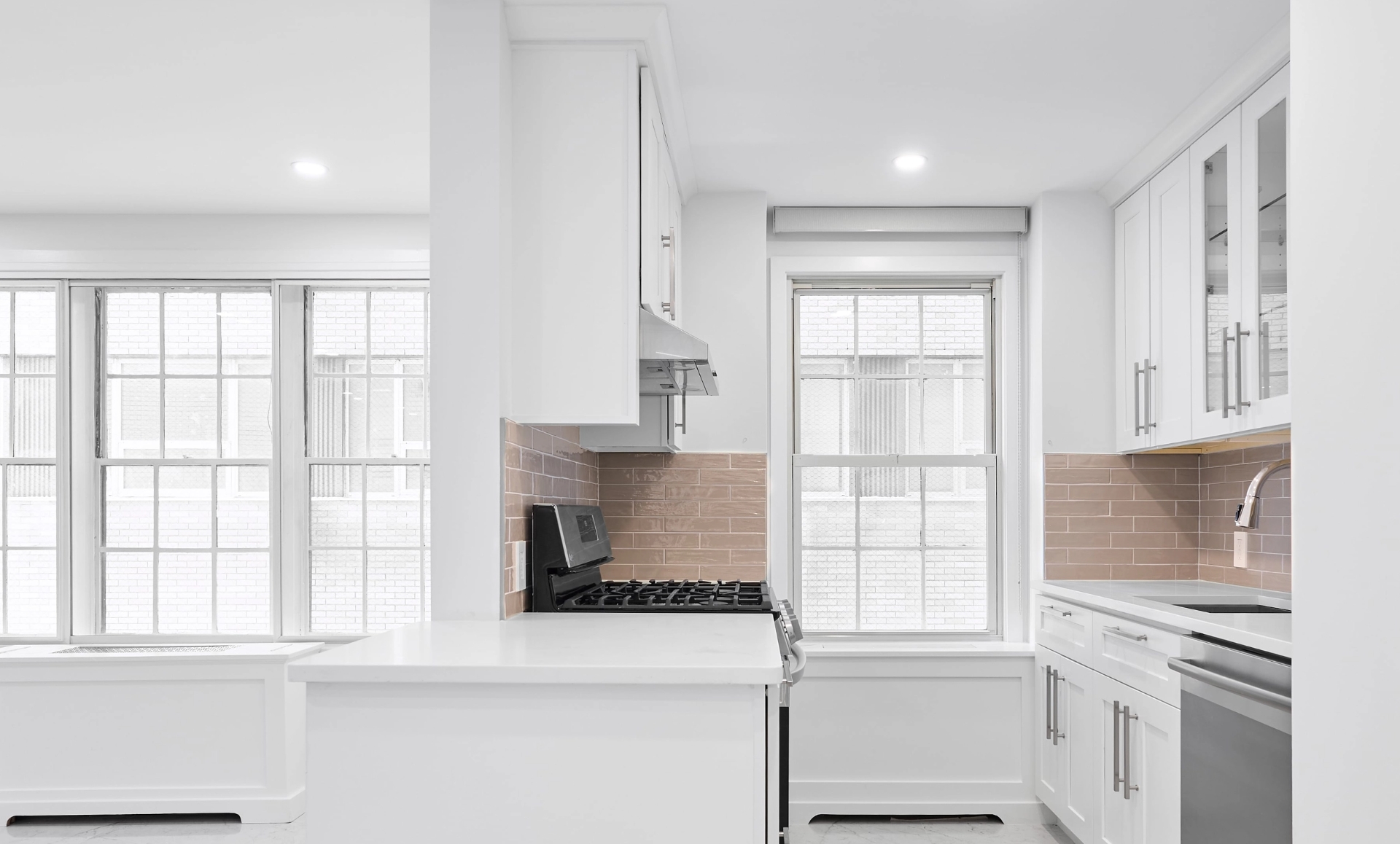 UES apartment renovation after photo showing ADA compliant master bathroom with curb-less shower