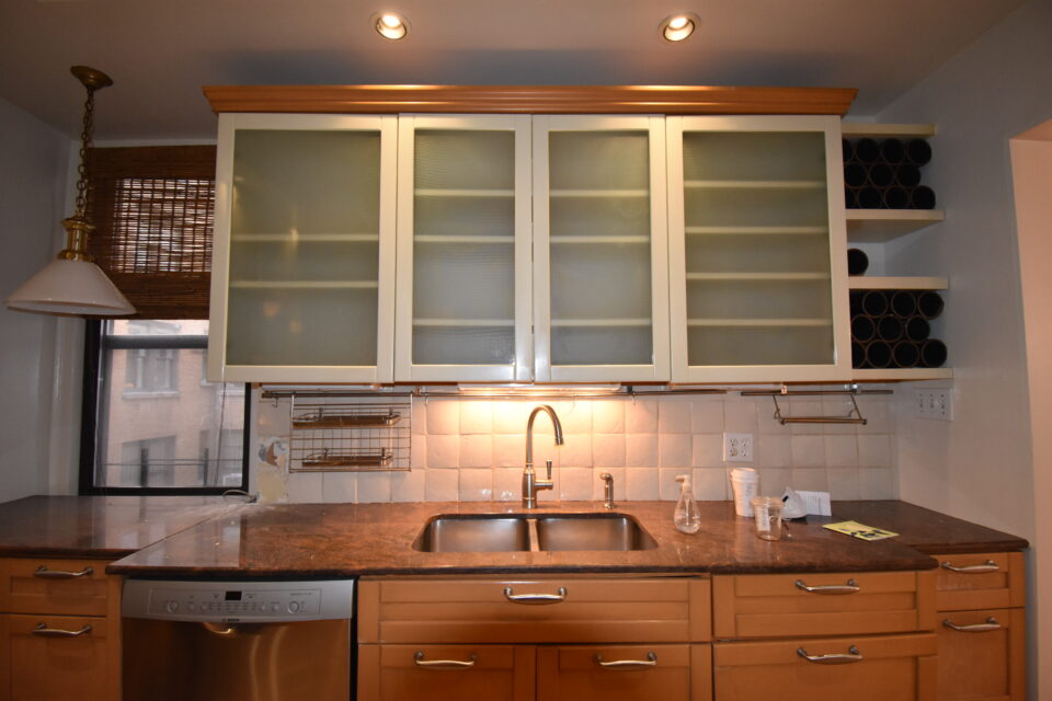 UES apartment renovation before photo showing outdated bathroom