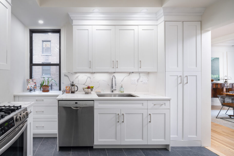 UES apartment renovation after photo showing renovated bathroom with modern fixtures