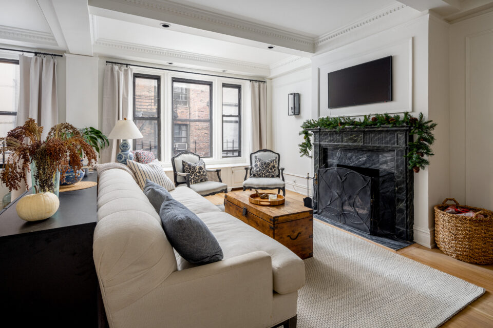 UES apartment renovation after photo showing spacious dining area with geometric flooring