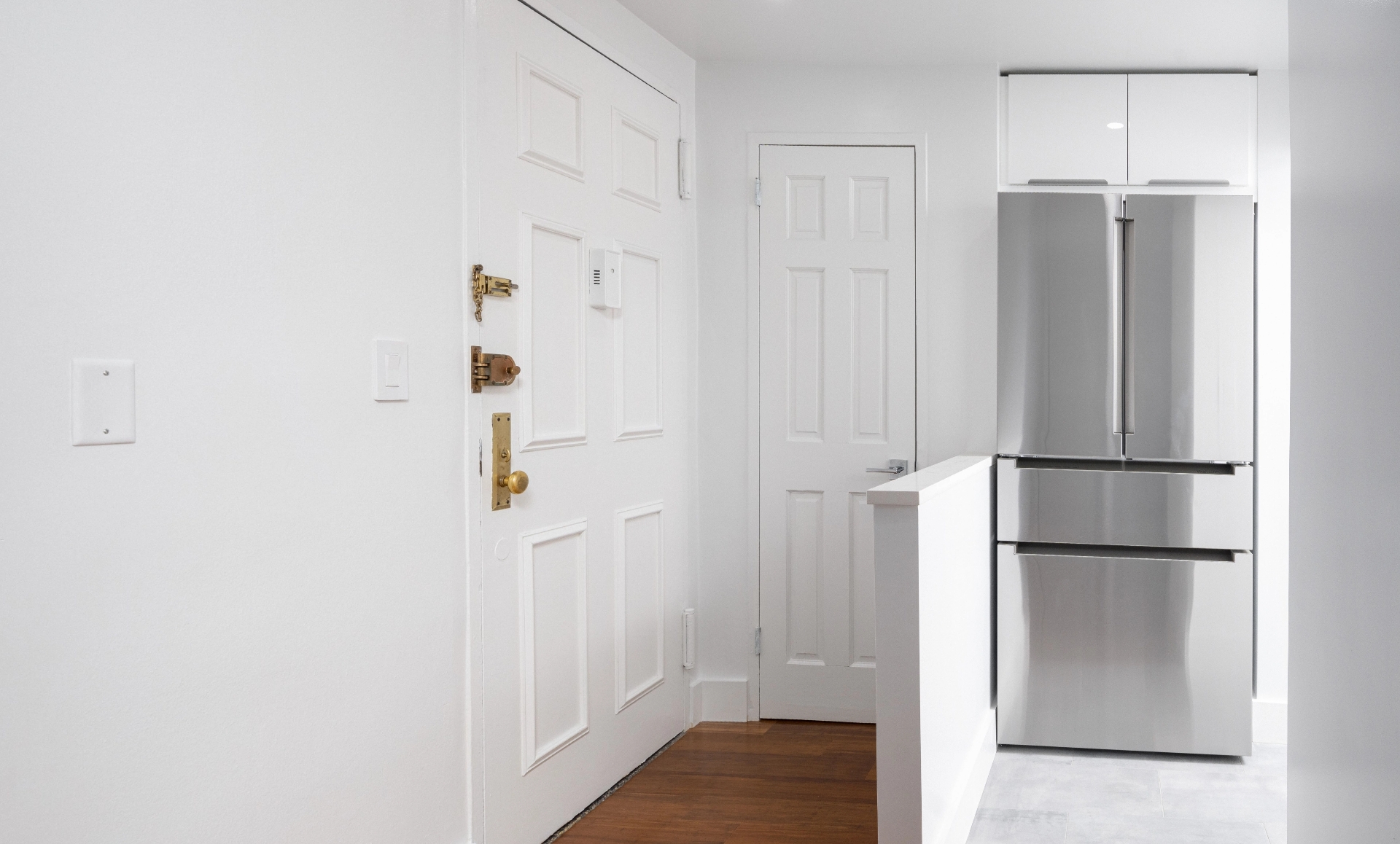 UES apartment after renovation with expanded kitchen and office space