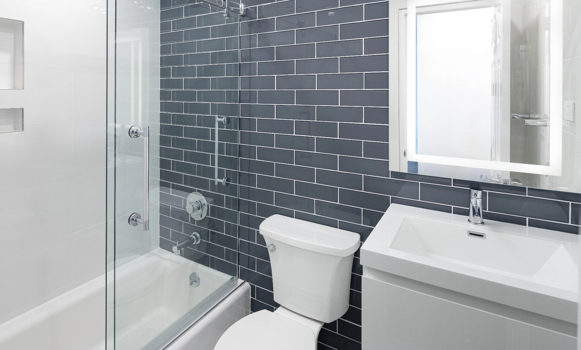 UES apartment after renovation with knee wall and open kitchen feeling