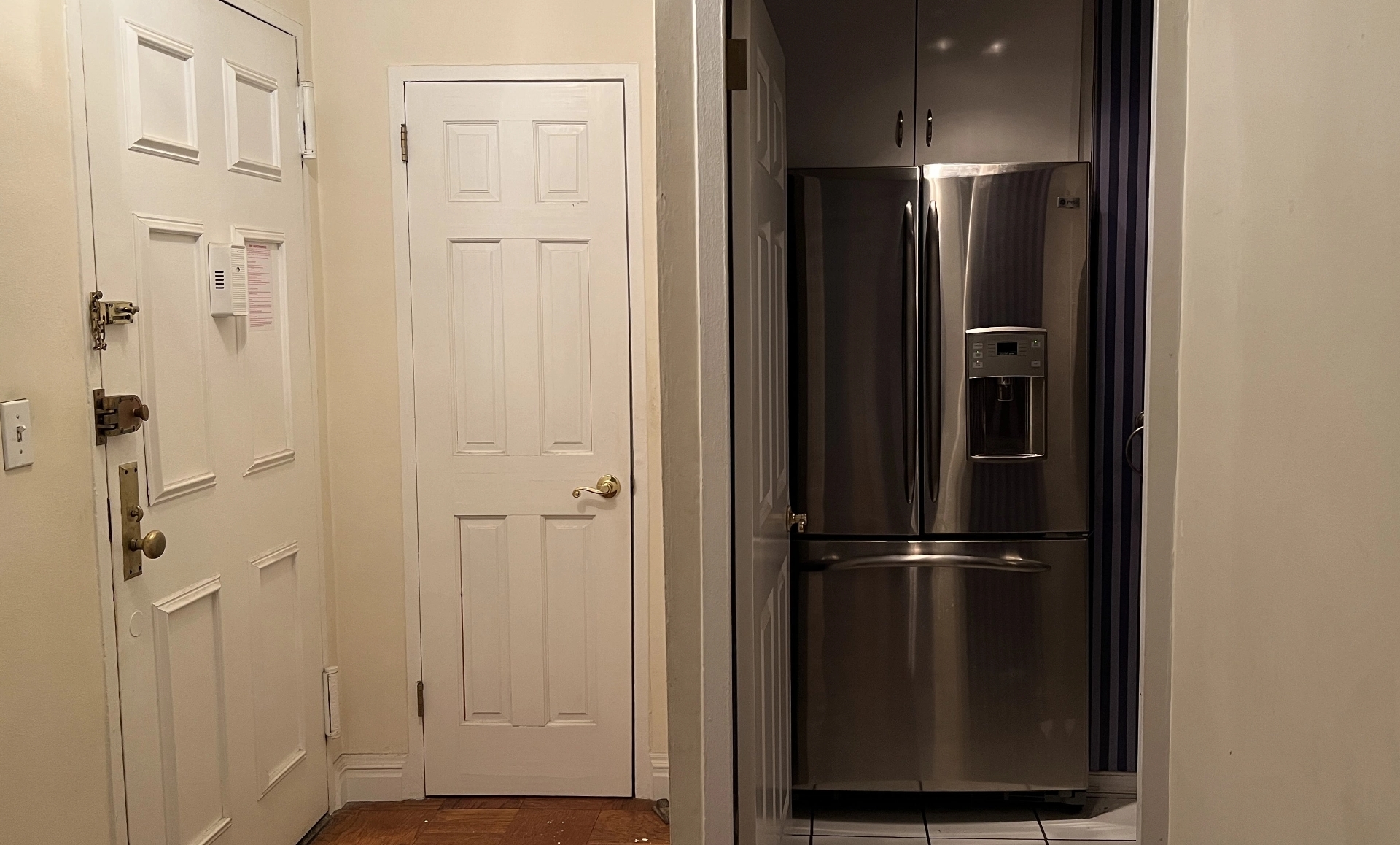UES apartment before renovation showing separated kitchen and office