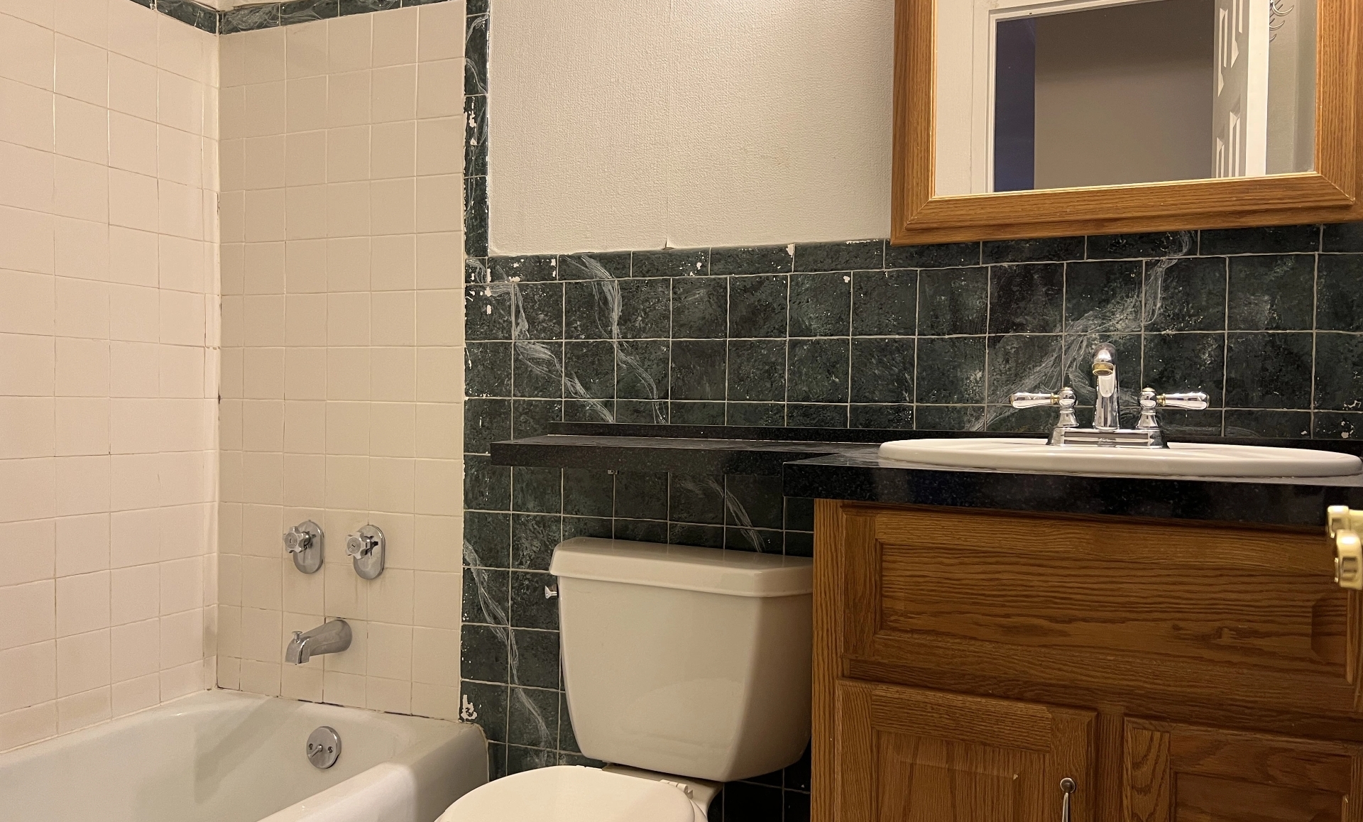 UES apartment before renovation showing closed kitchen layout