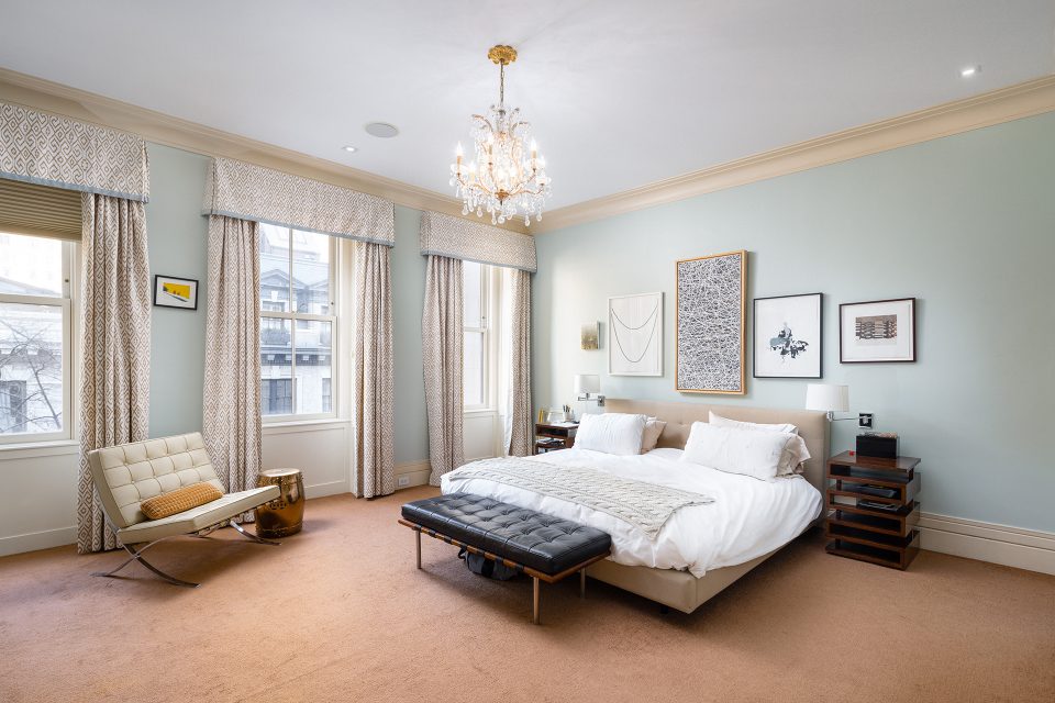 Bedroom renovation in UES townhouse featuring fresh paint and wallpaper