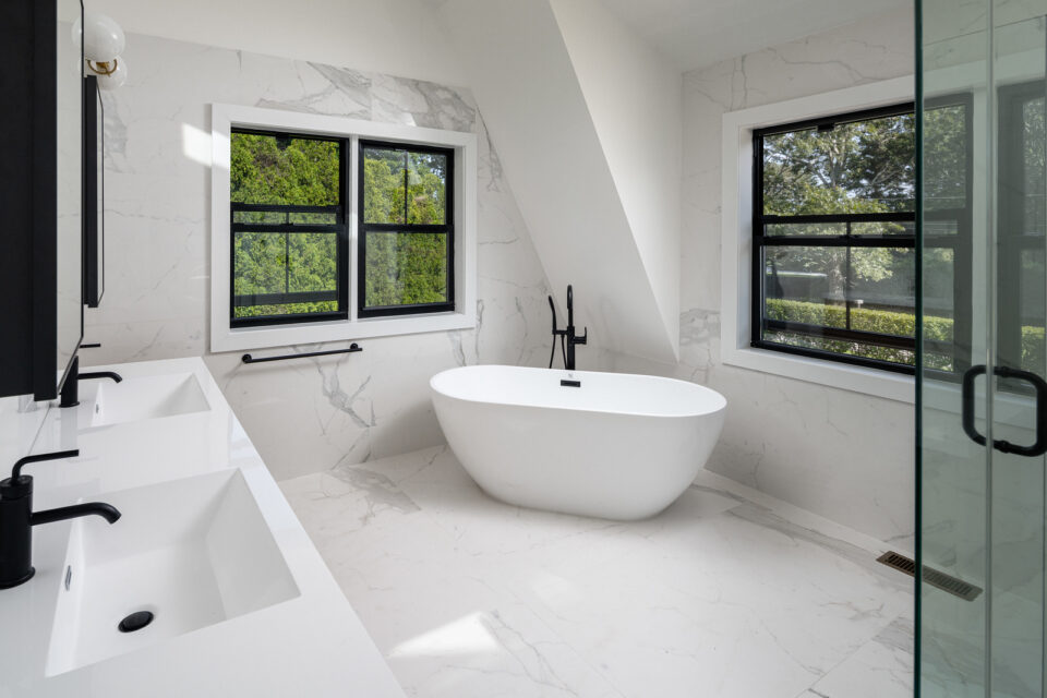 Interior remodel of Hamptons farmhouse with white oak floors and spa-like bathroom